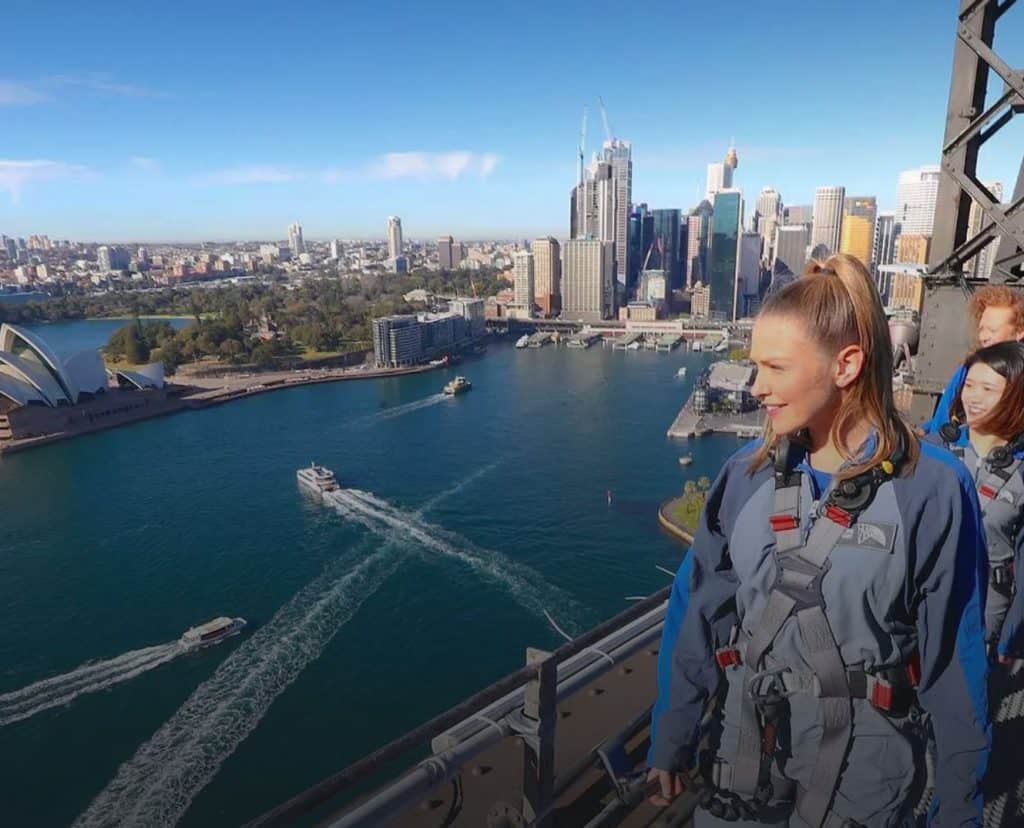 girl climbing sydney harbour bridge