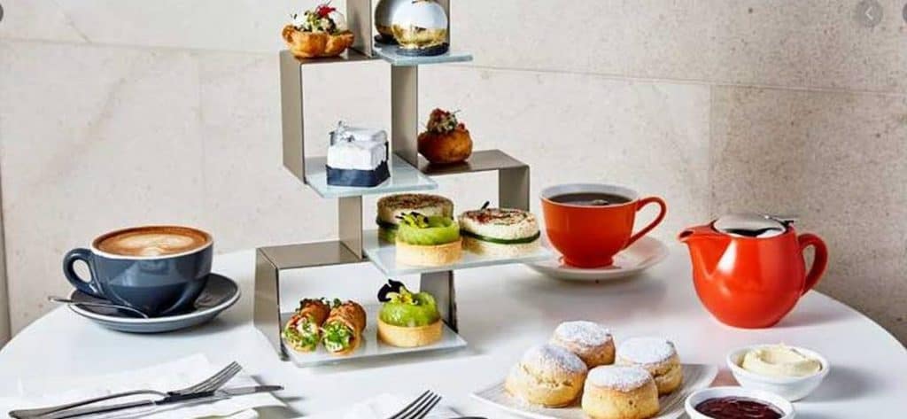 fancy hilton high tea with cakes