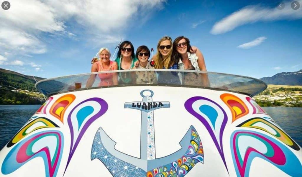 girls on boat in queenstown