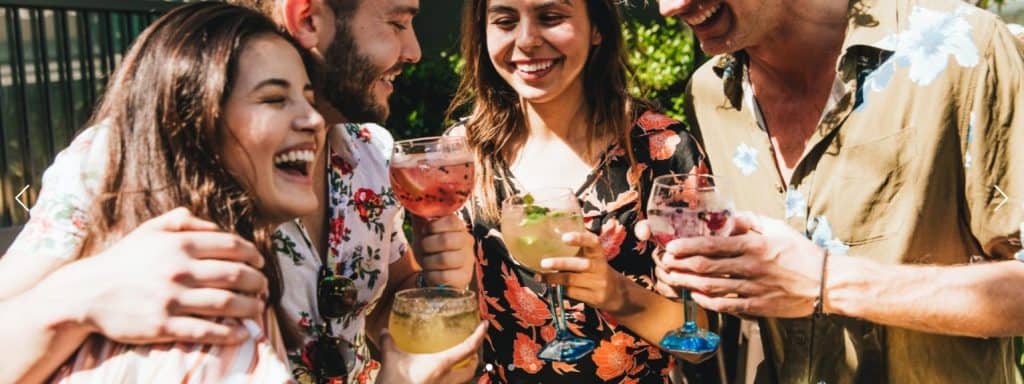 group of people with drinks in hand