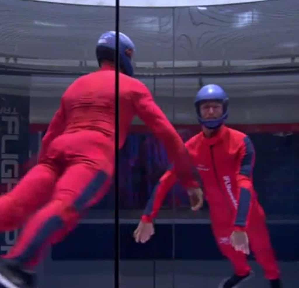 indoor skydiver in red suit