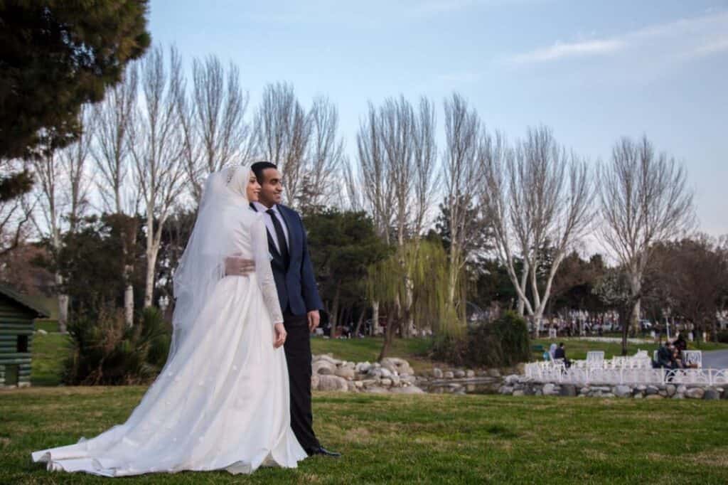 a wedding photography of a couple in the park · fr