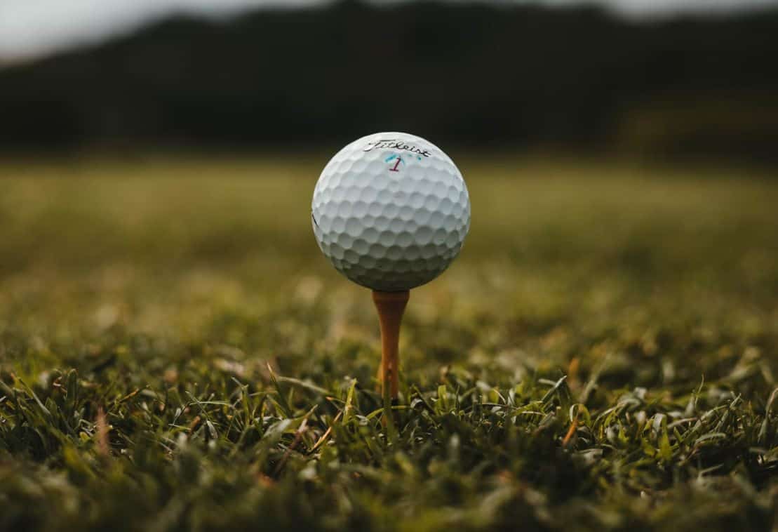 closeup photo of white golf ball photo – free golf